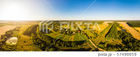 Aerial drone view of traditional Ukrainian village. 180 degrees panoramic landscape of countryside Aerial drone view of traditional Ukrainian village. 180 degrees panoramic landscape of countryside 57490059