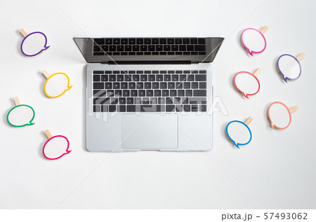 Social media concept with message bubbles and a laptop Social media concept with message bubbles and a laptop 57493062
