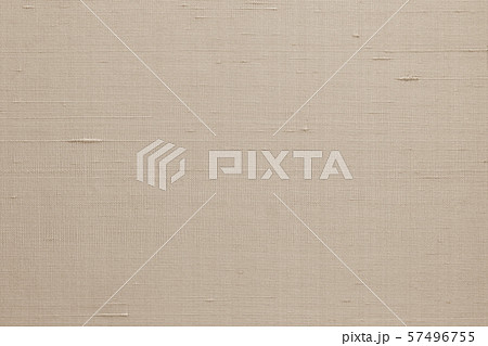 Authentic fine Thai silk fabric textile detailed background in light shiny sepia cream brown color Authentic fine Thai silk fabric textile detailed background in light shiny sepia cream brown color 57496755