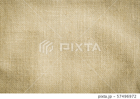 Hessian sackcloth woven texture pattern background in yellow beige cream brown color 57496972