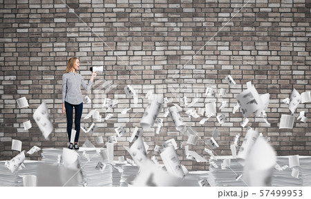 Woman keeping megaphone in hand. Woman keeping megaphone in hand. 57499953