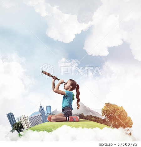 Concept of careless happy childhood with girl looking in future 57500735