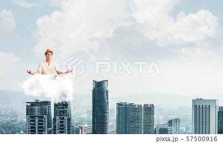 Young man keeping mind conscious. Young man keeping mind conscious. 57500916