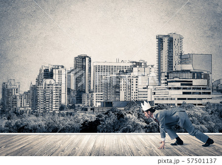 King businessman in elegant suit running and drawn cityscape silhouette at background King businessman in elegant suit running and drawn cityscape silhouette at background 57501137