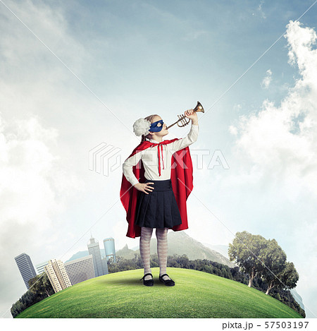 Girl power concept with cute kid guardian against cityscape background Girl power concept with cute kid guardian against cityscape background 57503197