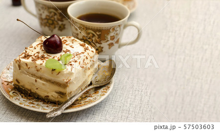 Tiramisu, a traditional Italian dessert in a light 57503603