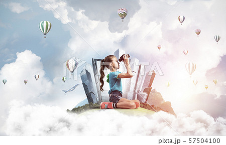 Concept of careless happy childhood with girl looking in future Concept of careless happy childhood with girl looking in future 57504100