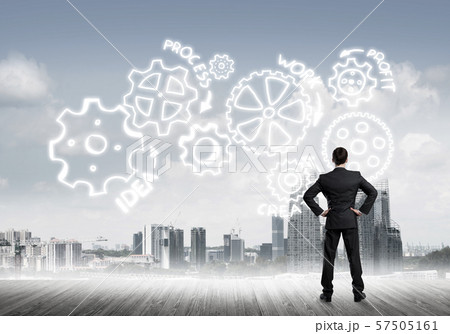 Cogwheel engine drawn on screen as symbol for teamwork and cooperation Cogwheel engine drawn on screen as symbol for teamwork and cooperation 57505161