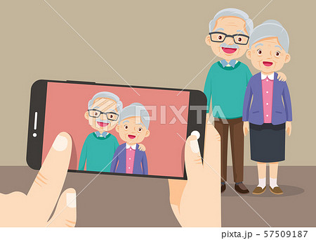 hand hold smartphone with the grandparents take hand hold smartphone with the grandparents take 57509187