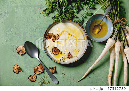 Parsnip soup with butter sauce Parsnip soup with butter sauce 57512789