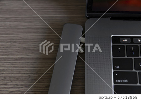 The USB adapter under the Type-C connector for laptop. Multiport station for laptop with multiple The USB adapter under the Type-C connector for laptop. Multiport station for laptop with multiple 57513968