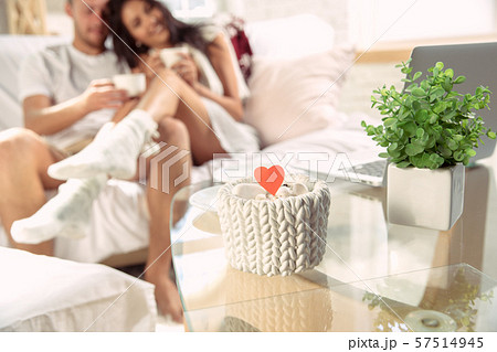 Couple of lovers at home relaxing together, comfortable 57514945