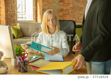 A young businesswoman moving in office, getting new work place 57516028