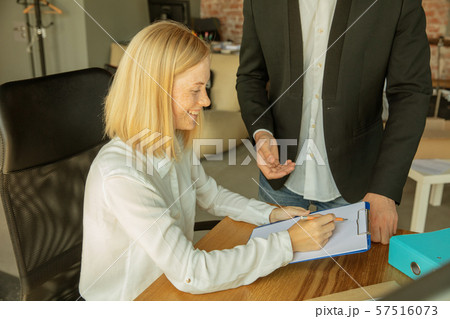 A young businesswoman moving in office, getting new work place 57516073