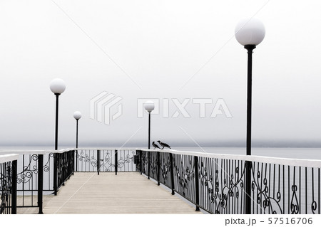 foggy pier with lanterns foggy pier with lanterns 57516706