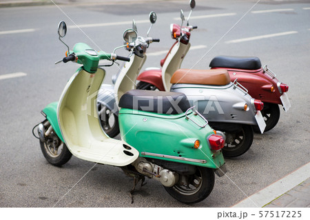 mopeds on the street in the city mopeds on the street in the city 57517225