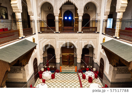 MARRAKESH, MOROCCO - JAN 2019: Moroccan architecture traditional arabian design - Rich Riyad patio MARRAKESH, MOROCCO - JAN 2019: Moroccan architecture traditional arabian design - Rich Riyad patio 57517788