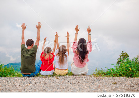 Beautiful happy family in mountains in the background of fog 57519270