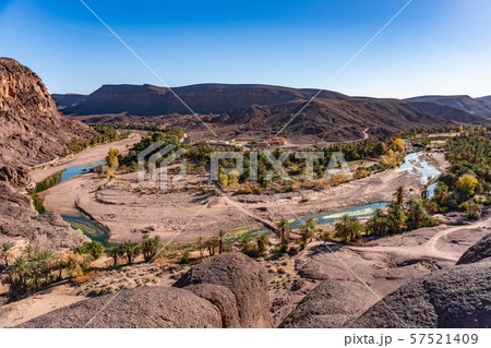 Beautiful Desert oasis landscape Panorama in Oasis De Fint near Ourzazate in Morocco, North Africa Beautiful Desert oasis landscape Panorama in Oasis De Fint near Ourzazate in Morocco, North Africa 57521409