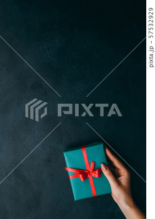 holidays surprise gift box teal blue background 57532929