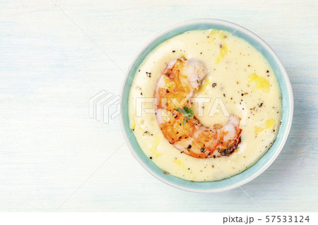 A shrimp with a dip, a seafood appetizer, shot from the top with copyspace 57533124