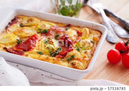 Casserole with sweet potatoes, brussel sprouts, bacon Casserole with sweet potatoes, brussel sprouts, bacon 57538785