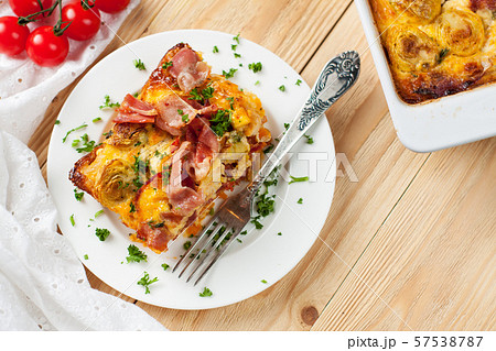 Casserole with sweet potatoes, brussel sprouts, bacon Casserole with sweet potatoes, brussel sprouts, bacon 57538787