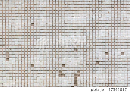 Old white square tile with embossed squares Old white square tile with embossed squares 57543817