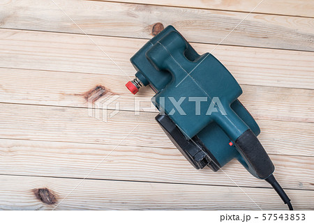 Electric belt sander, sanding machine lying on a 57543853
