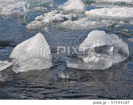 Floating chunks of ice from the glacier in Iceland Floating chunks of ice from the glacier in Iceland 57544187