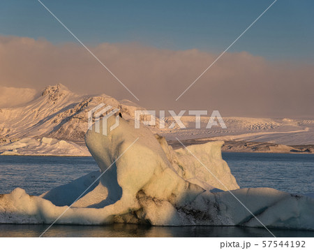 Ice floe in the glacier lagoon with morning sun 57544192