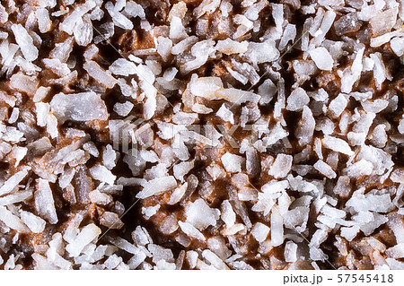 Macro picture of coconut flakes topping on 57545418
