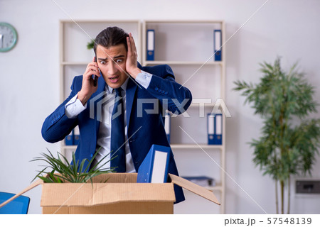 Young employee being made redundant Young employee being made redundant 57548139
