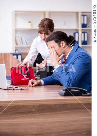 Young employee suffering in the office 57548145