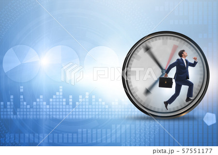 Businessman employee in time management concept Businessman employee in time management concept 57551177