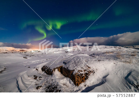 Northern Lights on the shore of the Arctic Ocean. Northern Lights on the shore of the Arctic Ocean. 57552887