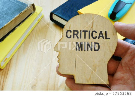 Critical mind sign on the wooden haed shape. 57553568