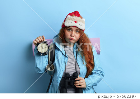tired nervour young woman isn't satisfied with holiday tired nervour young woman isn't satisfied with holiday 57562297