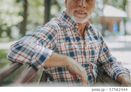 Man on the bench relaxing in park stock photo Man on the bench relaxing in park stock photo 57562444