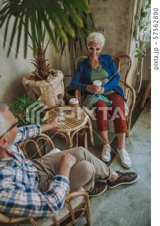 Happy lady with coffee in the cafe stock photo 57562890