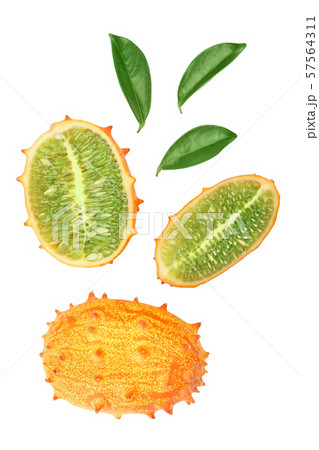 Kiwano or horned melon with leaves isolated on white background, Top view. Flat lay. Kiwano or horned melon with leaves isolated on white background, Top view. Flat lay. 57564311