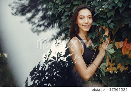 Cute girl have a rest in a summer park 57565522
