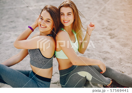Two girls on a beach 57569441