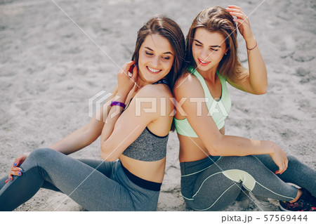Two girls on a beach 57569444
