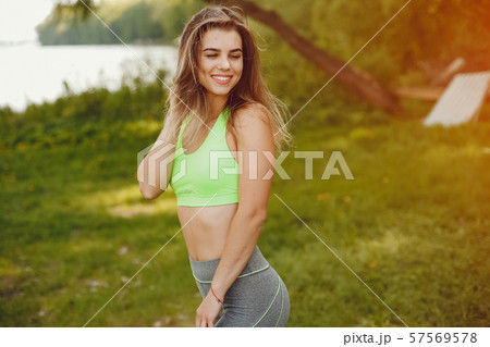 Sports girl in a park Sports girl in a park 57569578