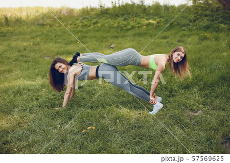 Sports girls in a park Sports girls in a park 57569625