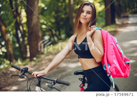 Sports girl in a park 57569671