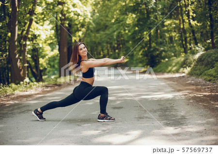 Sports girl in a park 57569737