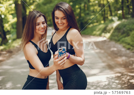 Sport girls in a park Sport girls in a park 57569763