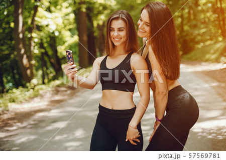 Sport girls in a park Sport girls in a park 57569781